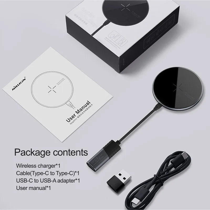 Black MagSlim magnetic wireless phone charger with foldable aluminium stand on a desk