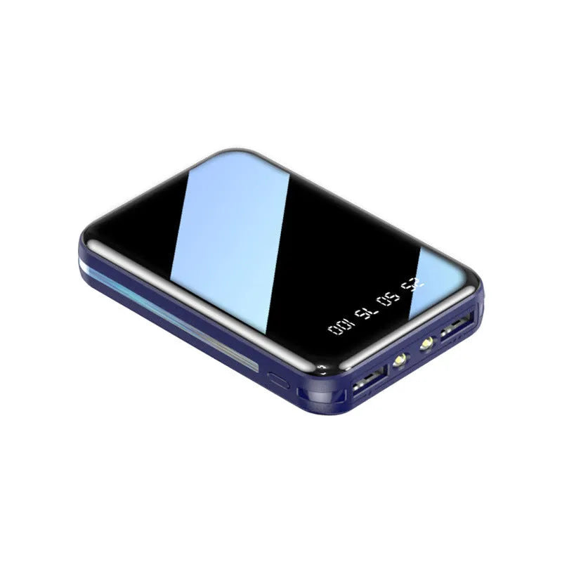 Compact white 20000mAh power bank with digital display showing battery percentage.