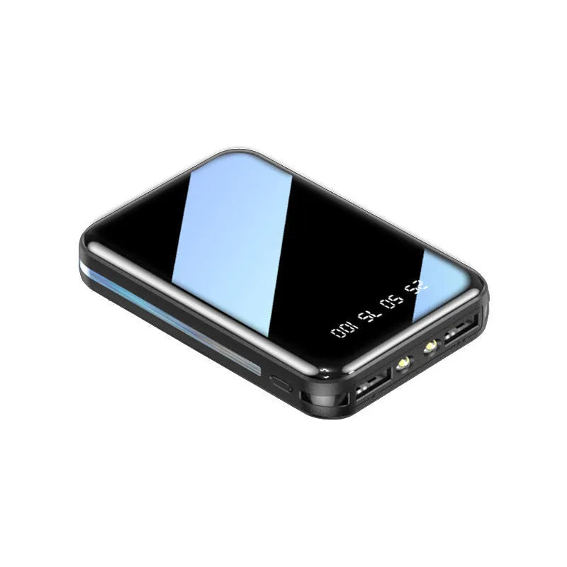 Compact white 20000mAh power bank with digital display showing battery percentage.