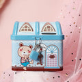 Blue house-shaped tinplate piggy bank for coin storage on wooden desk