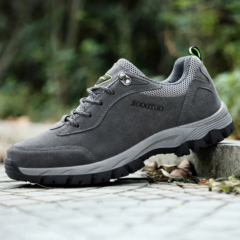Men's low-top outdoor hiking shoe in army green with cloth upper and mesh lining
