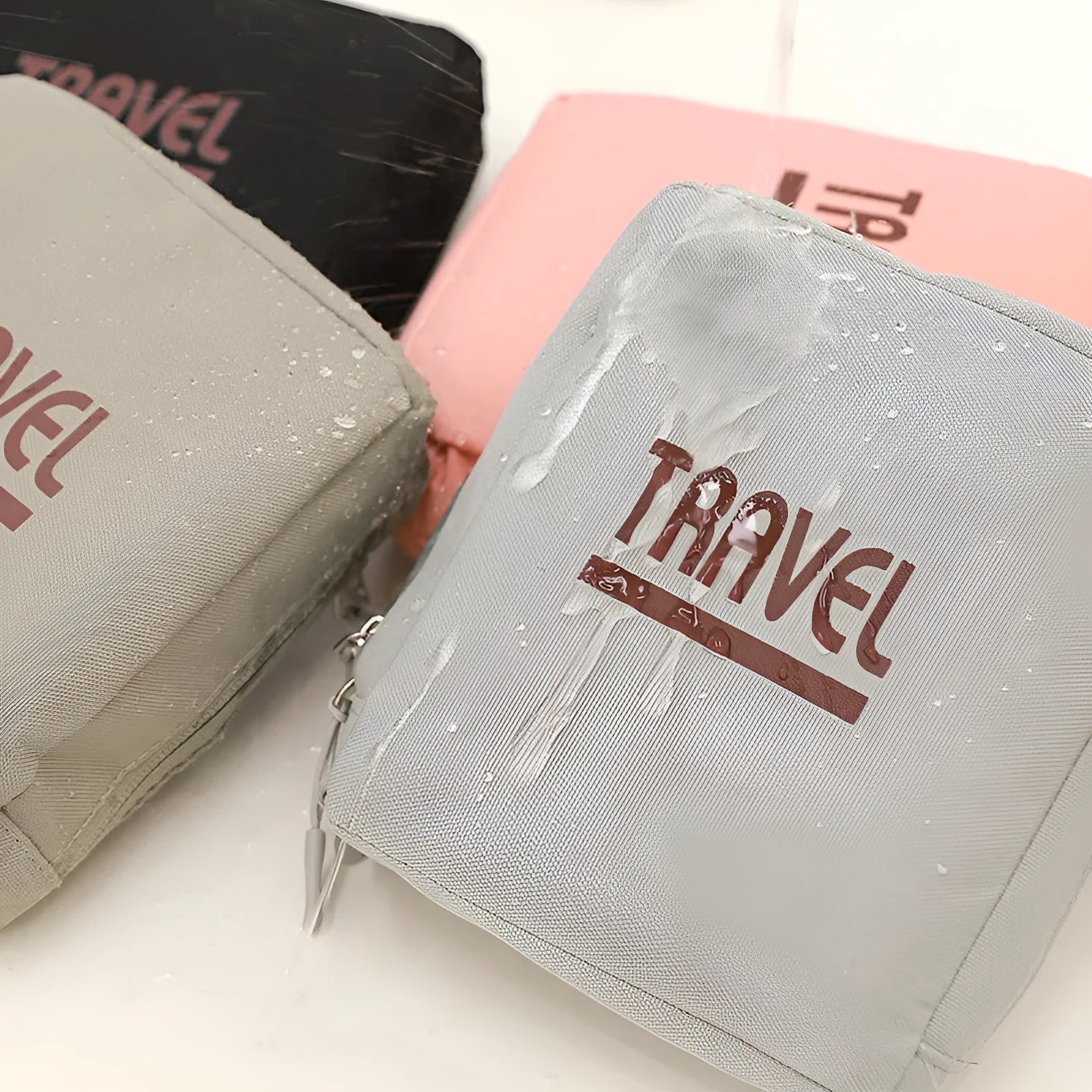 Black cube-shaped travel storage bag made from 300D Oxford cloth with a seal closure.