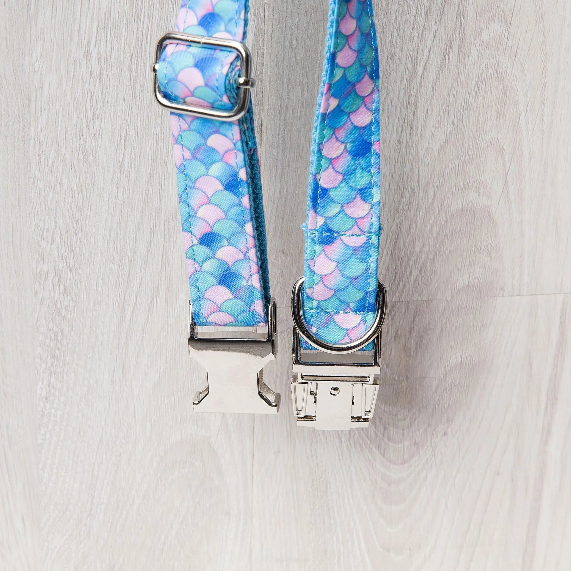 Blue mermaid polyester adjustable pet collar on white background showing buckle and size label