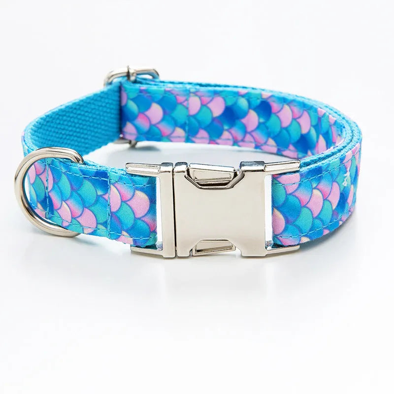 Blue mermaid polyester adjustable pet collar on white background showing buckle and size label