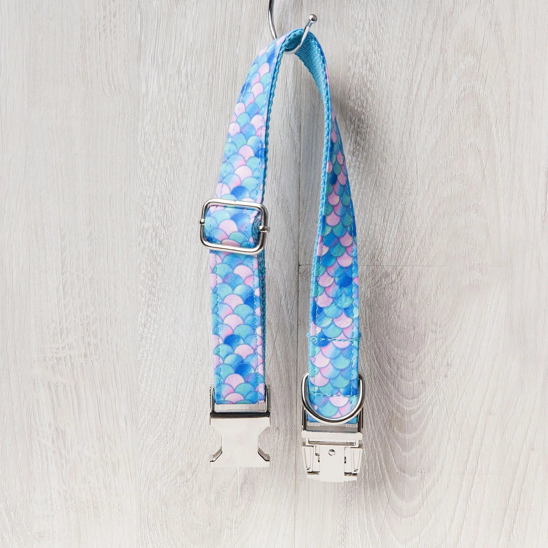 Blue mermaid polyester adjustable pet collar on white background showing buckle and size label