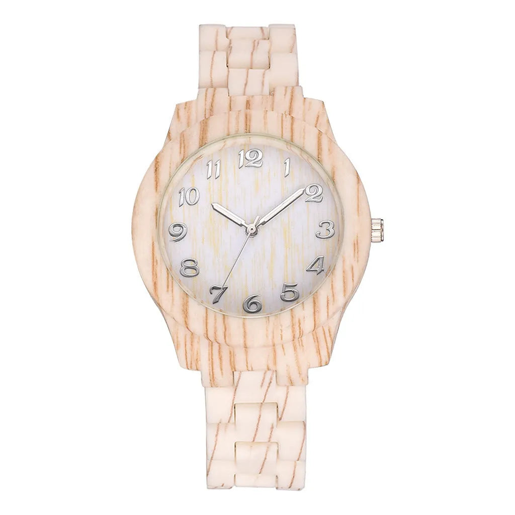 Wood grain dial quartz watch with brown silicone strap and single folding buckle clasp.