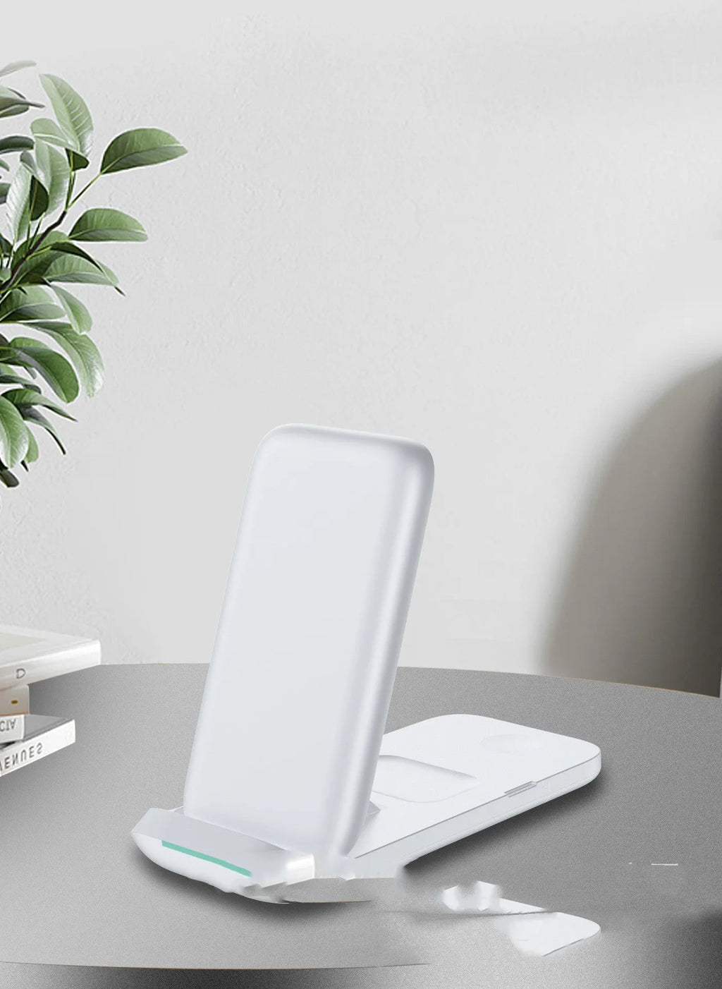 Black foldable three-in-one wireless charger showing both flat and angled positions