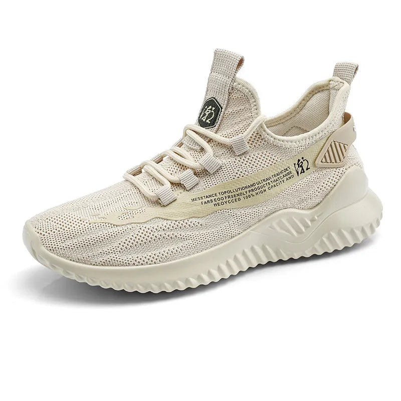 Men's white low-top sports shoes with mesh uppers and rubber soles displayed from side angle