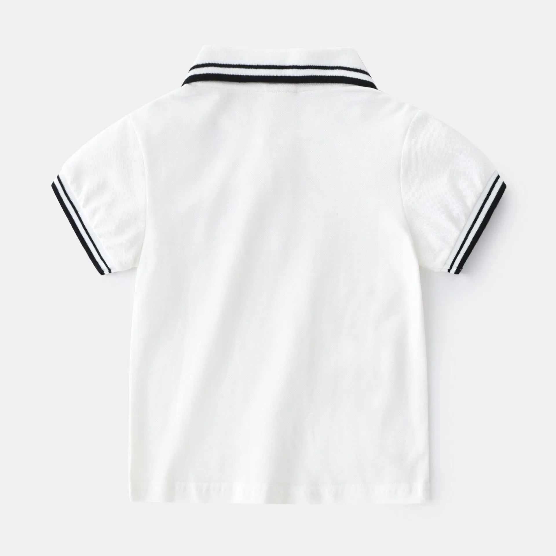Boys' white and black short-sleeved cotton polo shirt for summer.