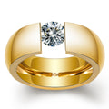 Geometric titanium steel ring with diamond finish in gold colour on a white background