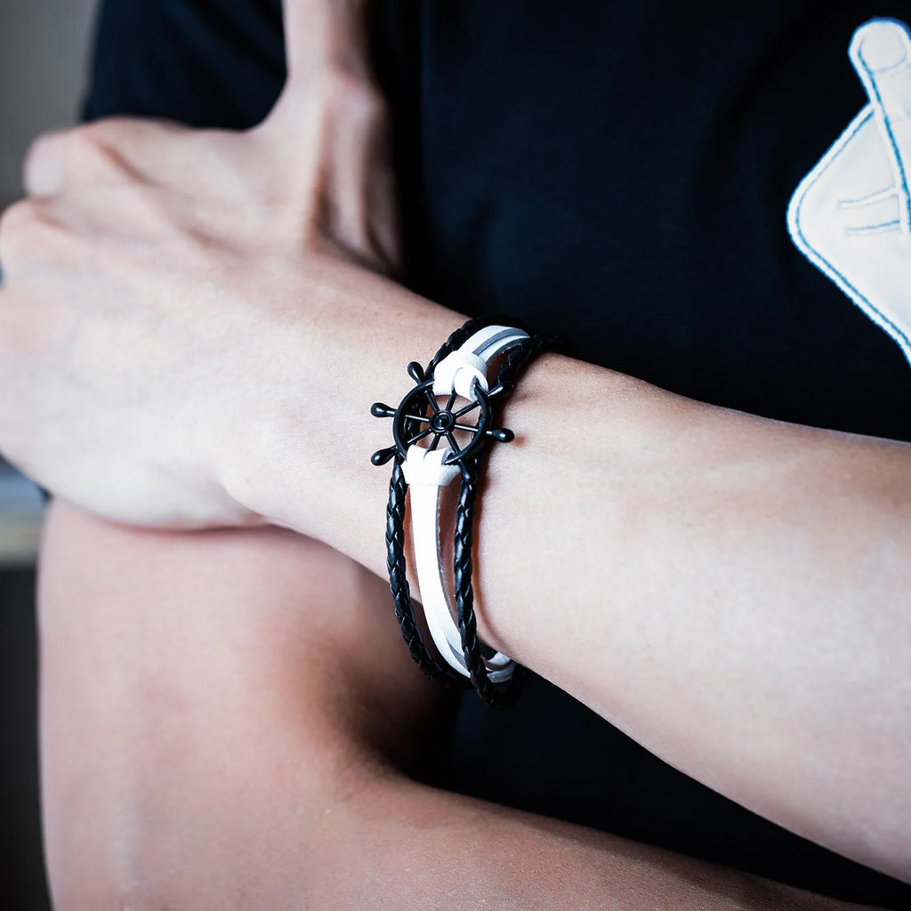 Alloy leather charm bracelet with black clasp fastening in brown colour option