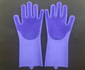 Blue silicone scrubbing gloves showing textured palm and finger surfaces for cleaning