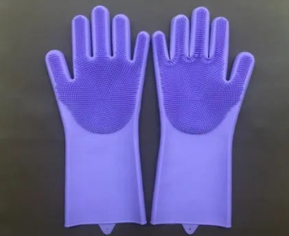 Blue silicone scrubbing gloves showing textured palm and finger surfaces for cleaning