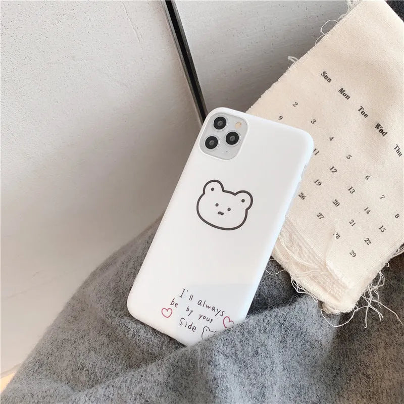 Soft silicone Apple iPhone case with a Korean cartoon bear design on the back.