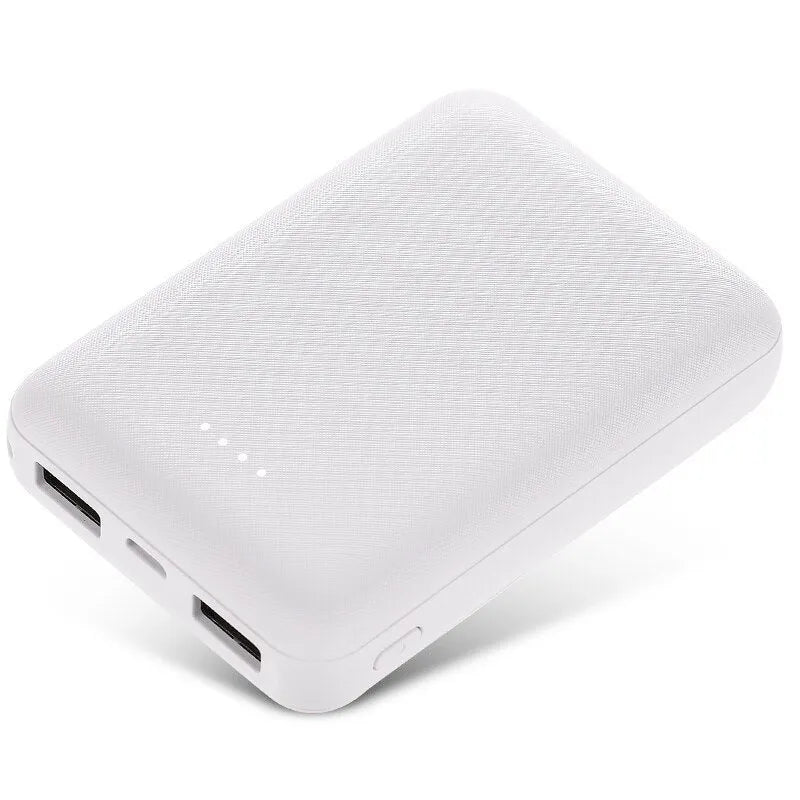 Black and white ultra-thin 10,000mAh power bank showing compact 90x63x22mm dimensions
