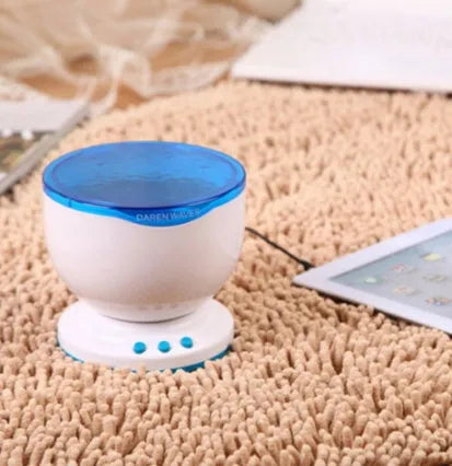 Blue coloured ocean theme projection lamp with DLP correction for children's rooms.
