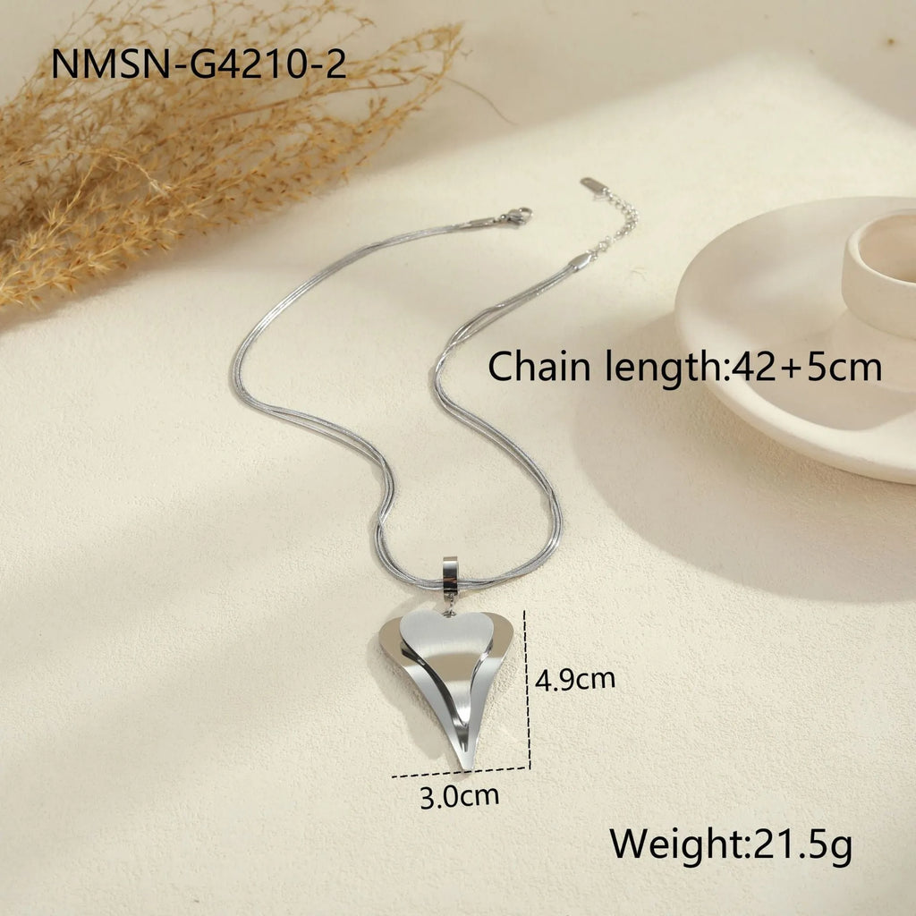 Stainless steel geometric necklace with double heart snake bones pendant in gold or steel colour options