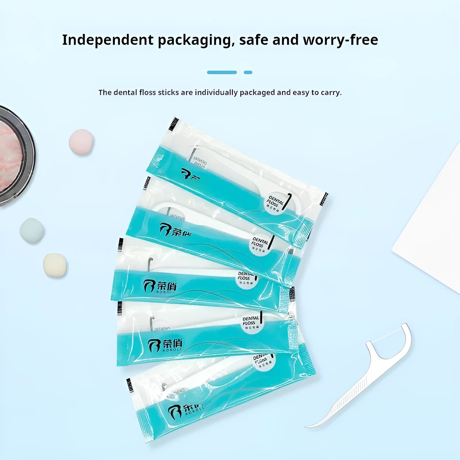 Dental floss with individual packaging showing 100 piece and 108 piece options in plastic material