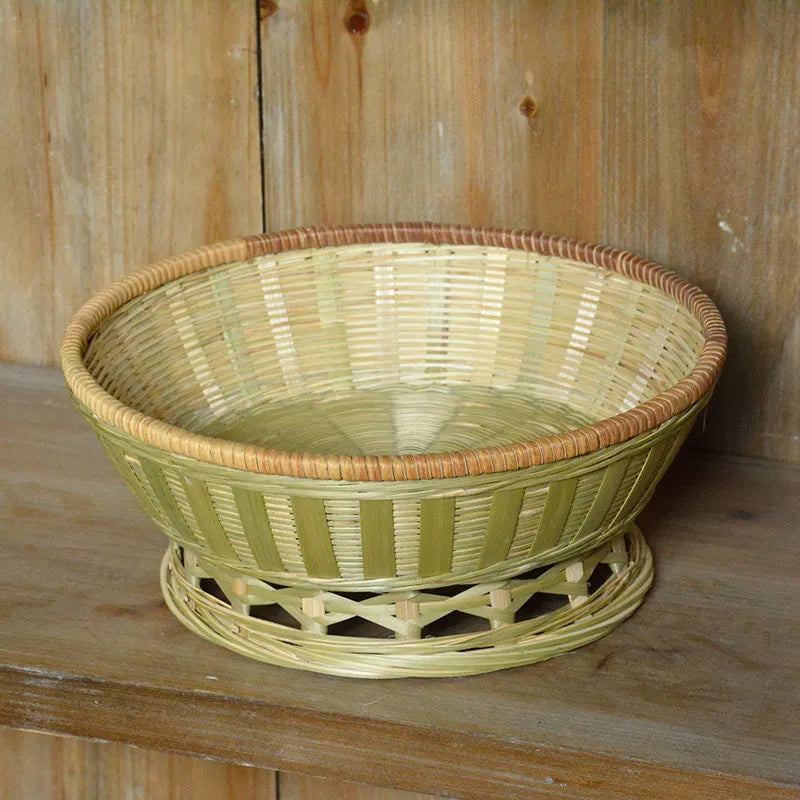 Handmade natural bamboo storage basket set showing three different sizes for household organisation