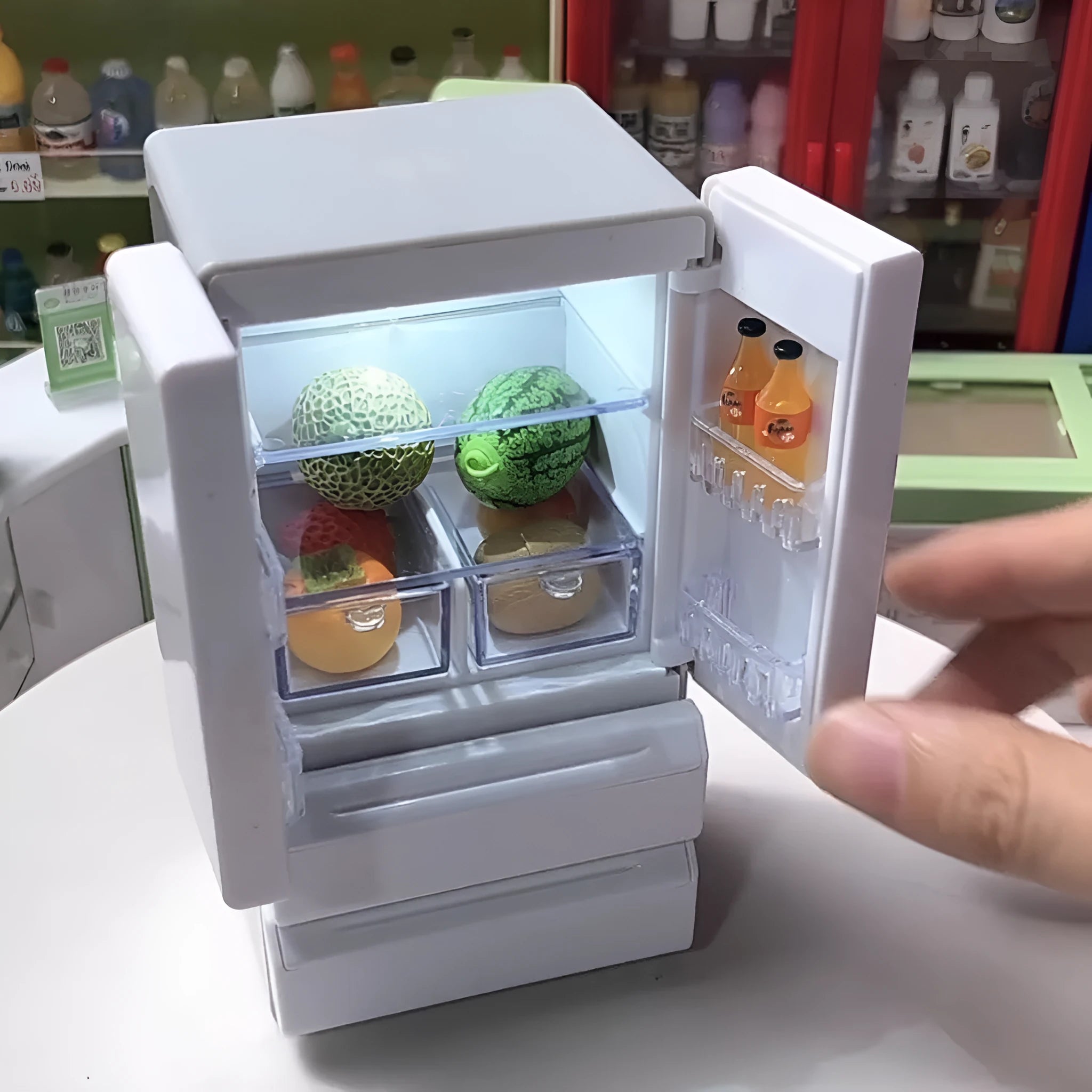 White plastic candy shop miniature model with LED light function displayed