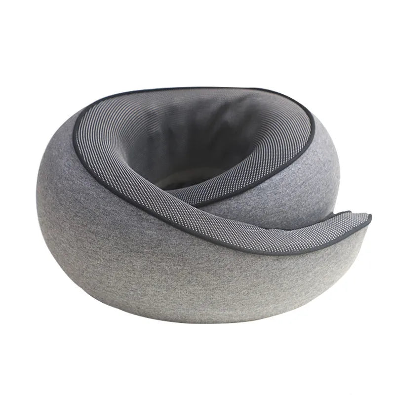 A U-shaped memory foam travel neck pillow in a simple design, shown with its matching storage bag.