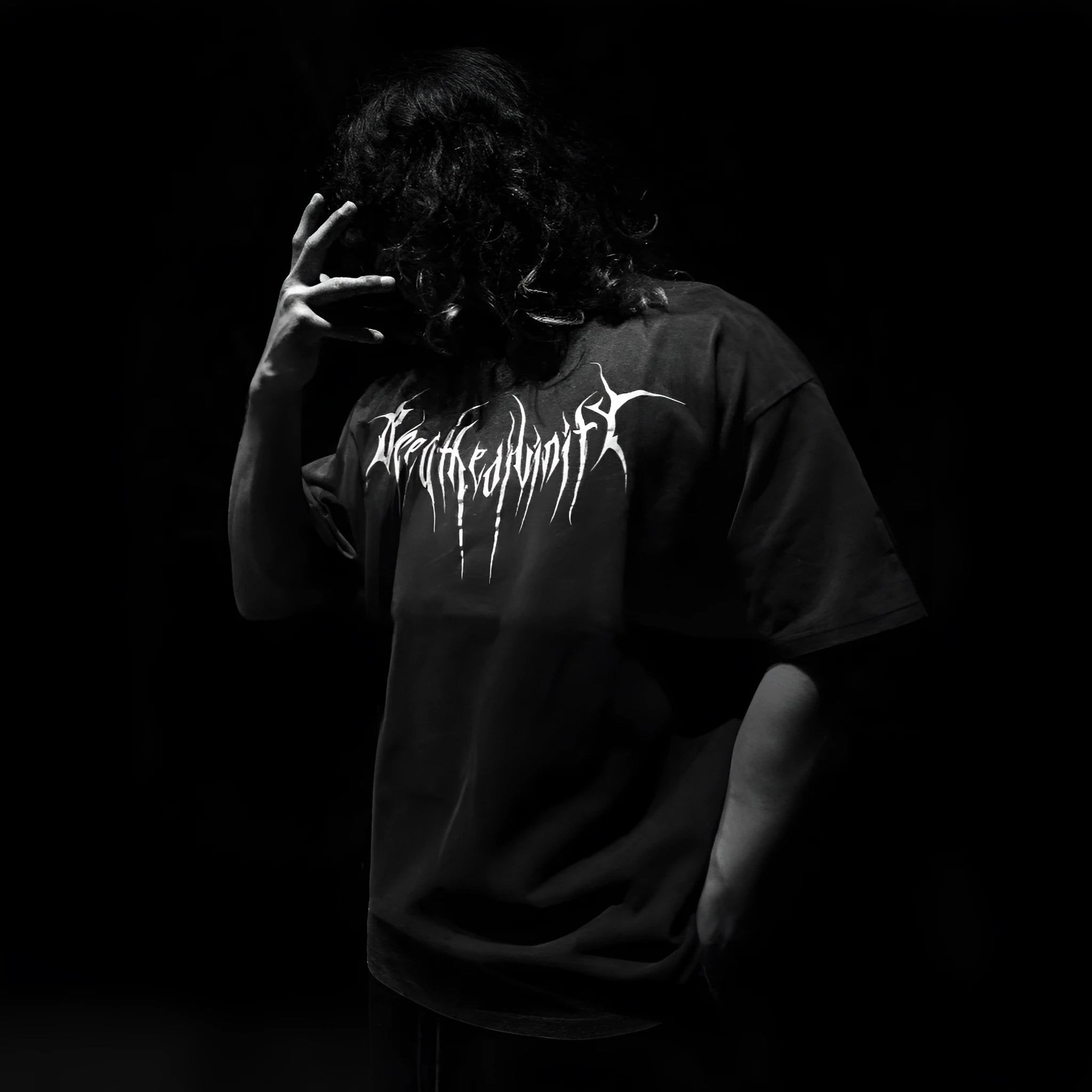 Dark style loose plus size cotton short-sleeved T-shirt with gilding decoration, shown in one of ten available colours.