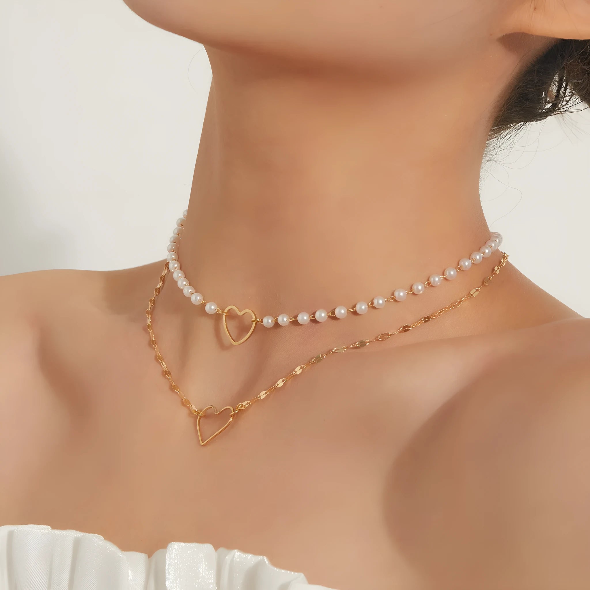 Gold heart-shaped zinc alloy pendant necklace on adjustable chain