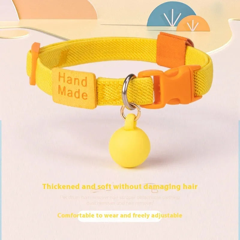 Small dog elastic polyester pet collar in seven colour options showing yellow, pink, and blue examples