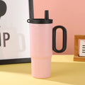 DIY Vitality large insulated straw cup with handle in black, pink, blue, white, or yellow.