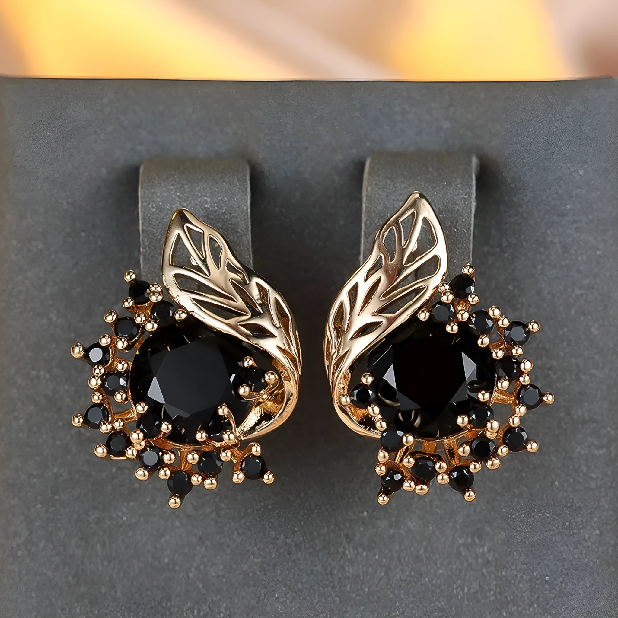 Round floral feather earrings in rose gold colour with crystal zircon stones, shown in six colour variations