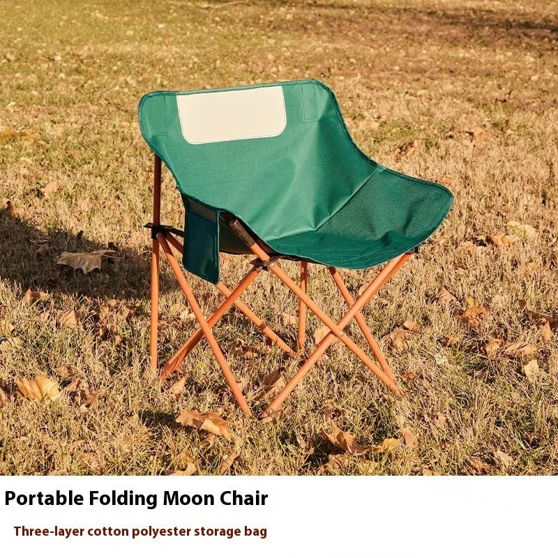 Beige folding camping chair with steel frame and Oxford cloth seat in open position