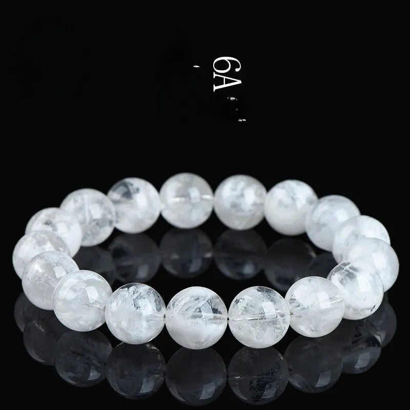 Women's crystal bracelet with round blizzard snowflake beads and geometric Ruyi Xiangyun design.