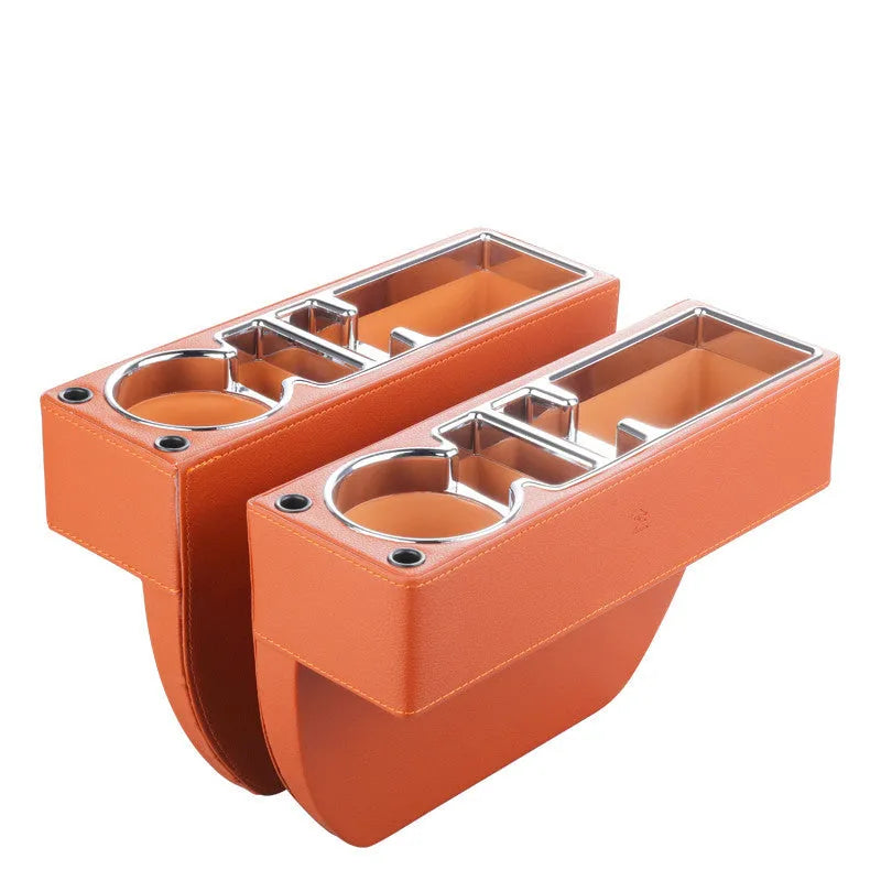 Black leather and plastic car seat gap storage box inserted between car seat and centre console