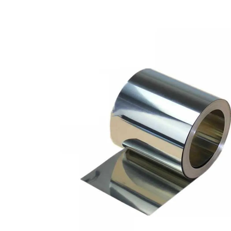 304 stainless steel metal shim strip on a workshop bench with a ruler showing its thin gauge.