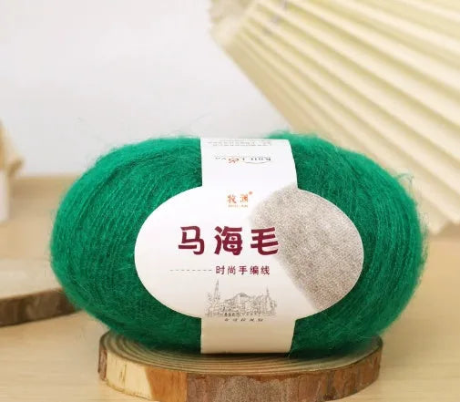 Mohair wool ball for DIY scarf knitting in assorted colours on white background