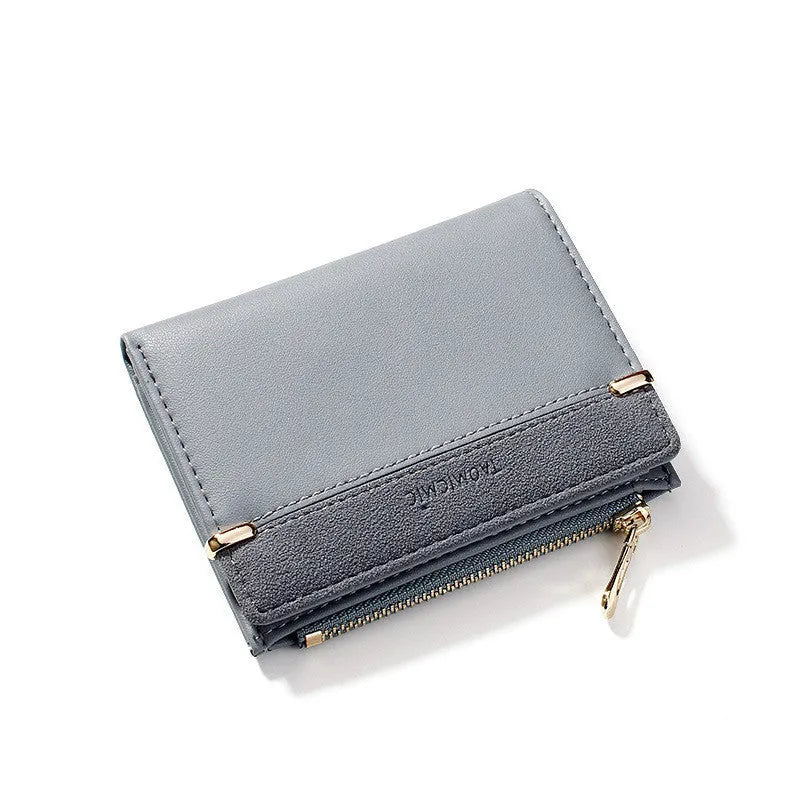 Ladies short zipper wallet in PU leather, open to show multiple card slots, bill holder, change slot, and hidden compartment.