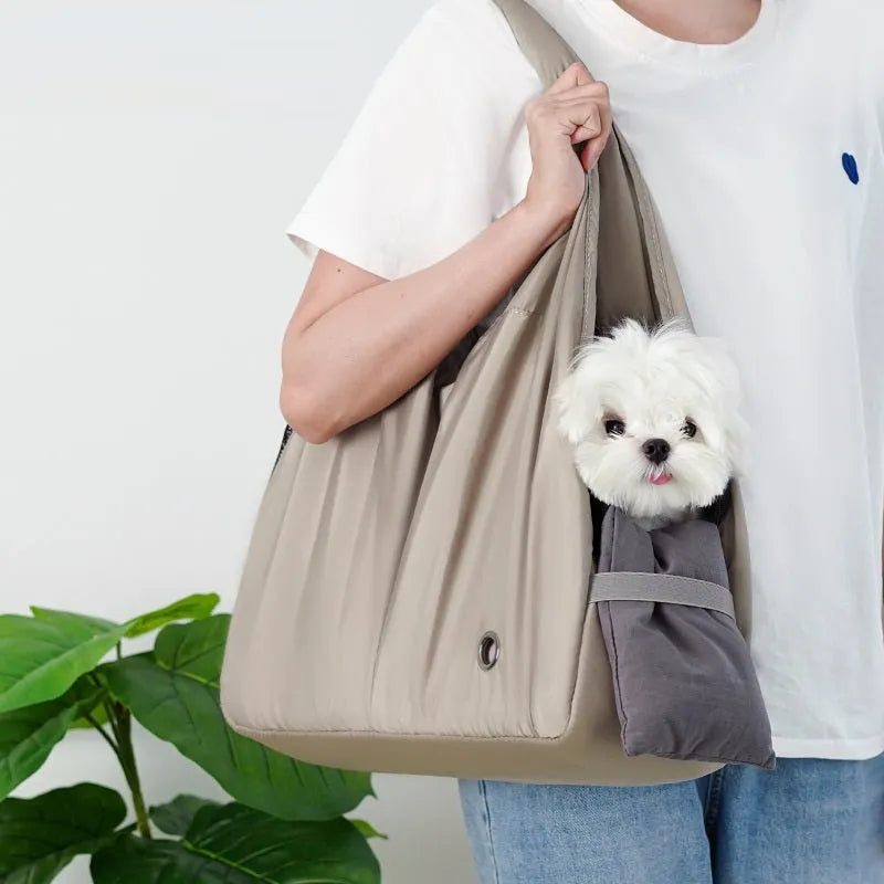 Apricot pet carrier bag with adjustable shoulder strap and side ventilation panels