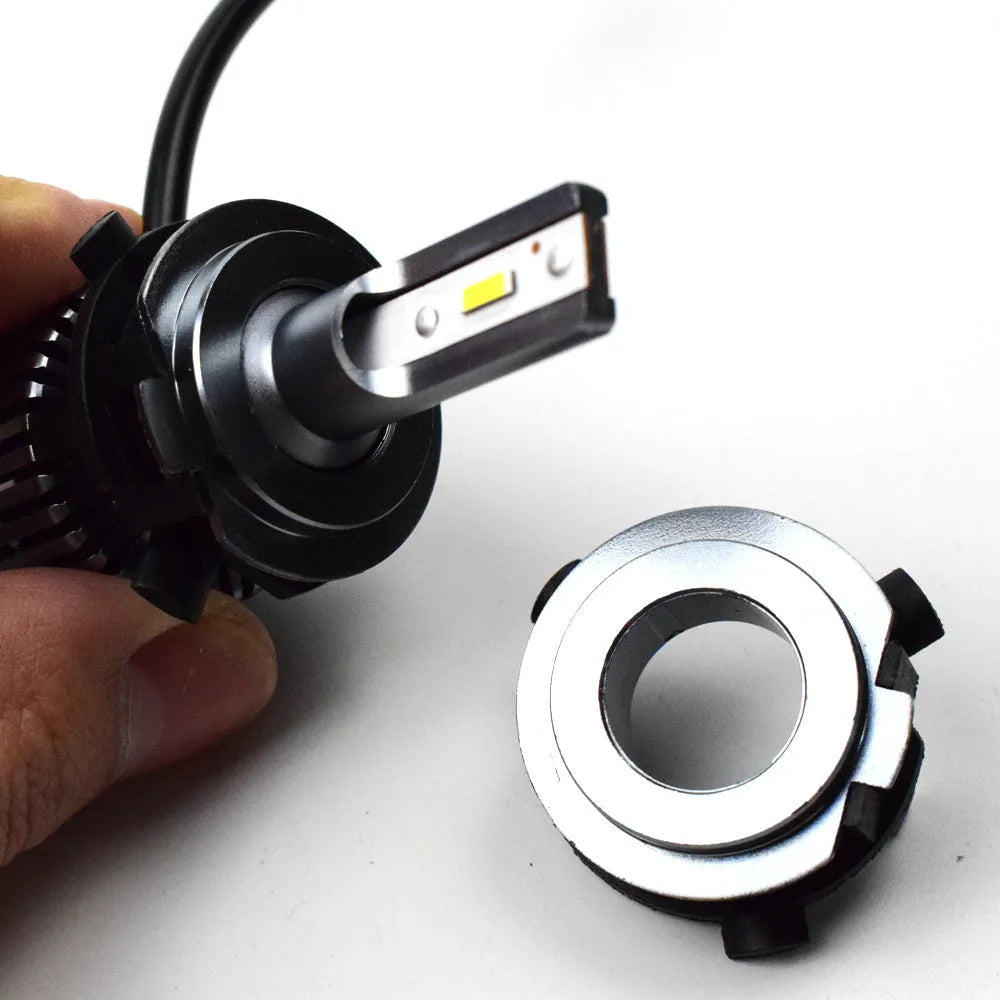 Black ABS plastic car headlight card holder for Nissan and Kia models showing compact size