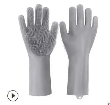 Blue silicone scrubbing gloves showing textured palm and finger surfaces for cleaning