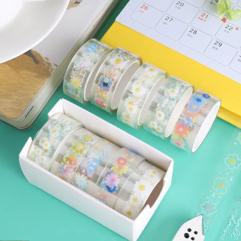 Five rolls of transparent adhesive tape with a Midsummer Daisy cartoon pattern, each 1.5cm wide.