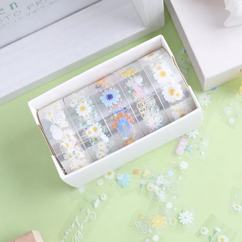 Five rolls of transparent adhesive tape with a Midsummer Daisy cartoon pattern, each 1.5cm wide.