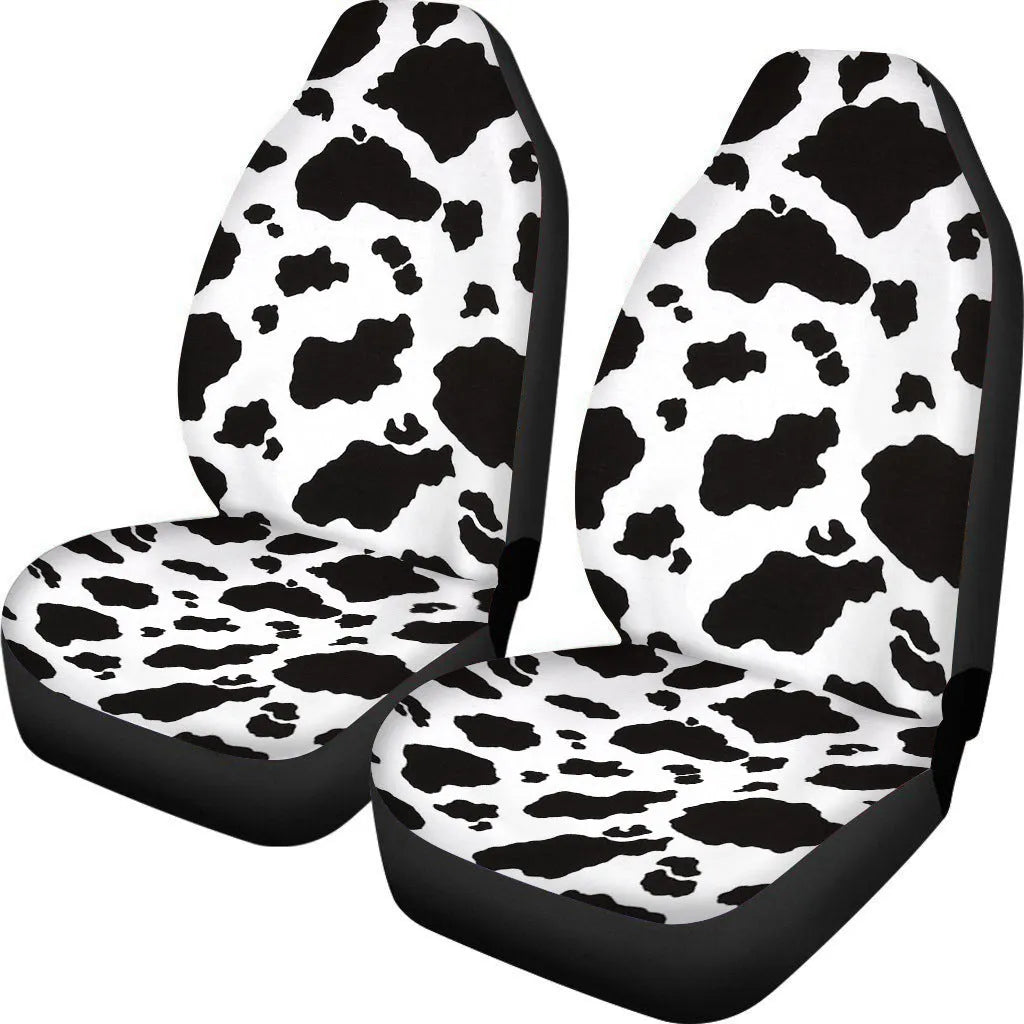 Cow spot leopard print retro pattern on a pair of universal fit polyester car seat covers.