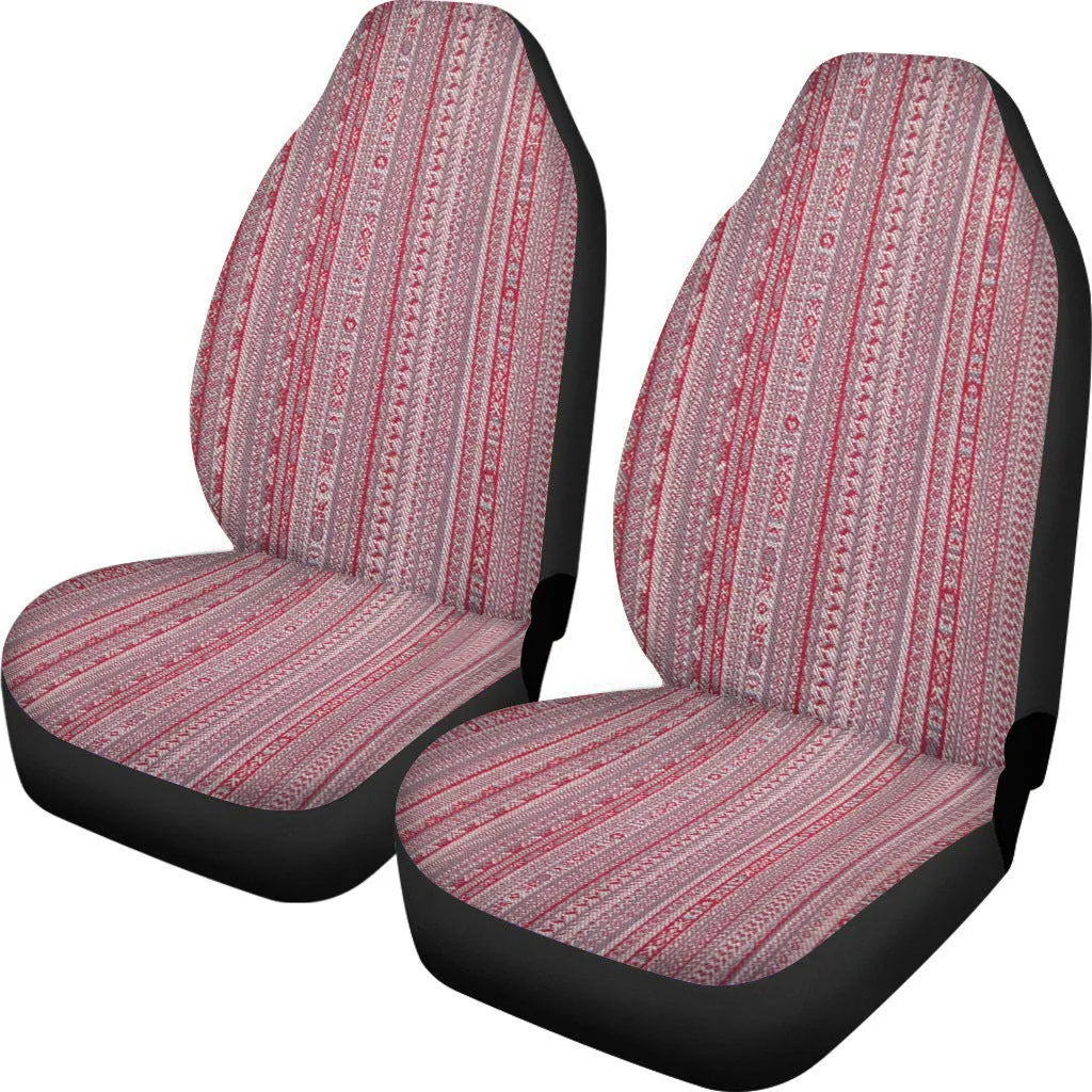 Cow spot leopard print retro pattern on a pair of universal fit polyester car seat covers.