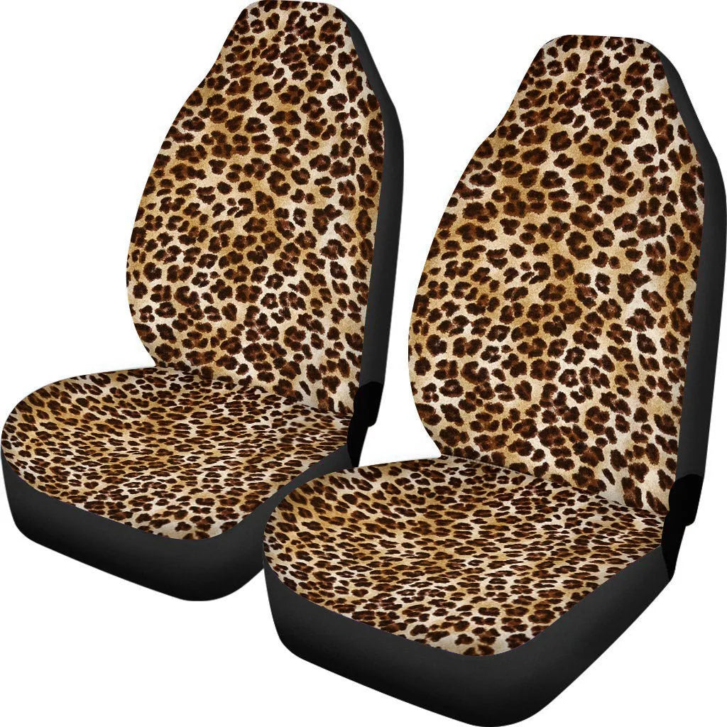 Cow spot leopard print retro pattern on a pair of universal fit polyester car seat covers.