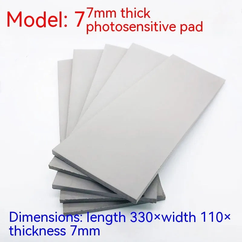 Black and grey light-sensitive seal mat for pottery and calligraphy projects showing 330mm x 110mm sheet