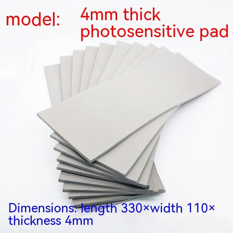 Black and grey light-sensitive seal mat for pottery and calligraphy projects showing 330mm x 110mm sheet