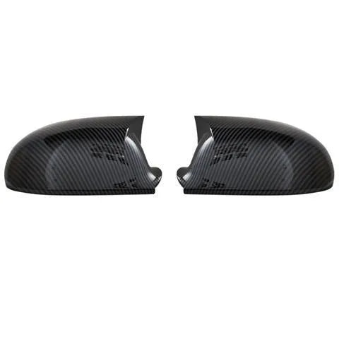 Pair of plastic Volkswagen Sagitar mirror housings in bright black and carbon fibre style finishes.