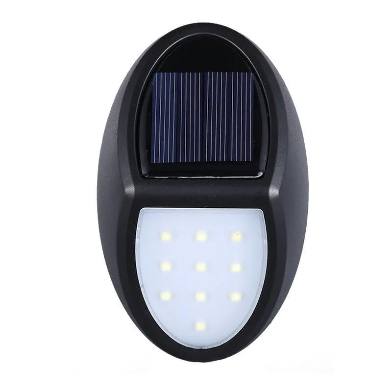 Black LED solar wall light with solar panel and automatic sensor for outdoor use