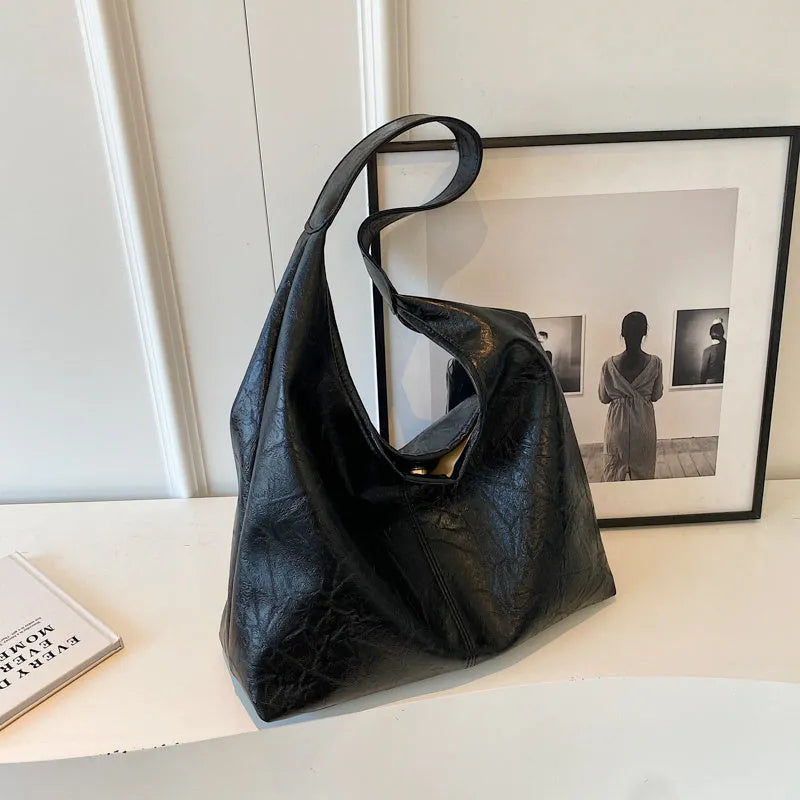 Soft PU leather casual shoulder bag with large capacity and street style design