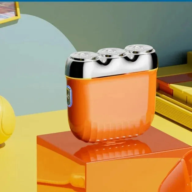 Three-head magnetic electric shaver in gun metal, orange, green or blue colours with floating cutter adjustment